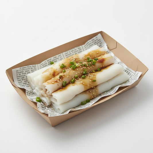 Cheung fun in open tray with newsprint paper