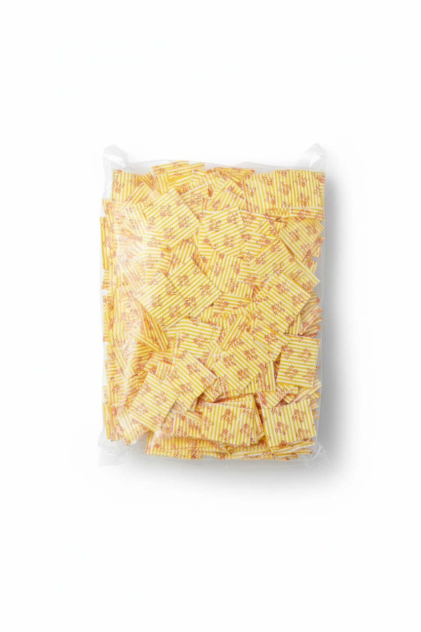 Package of striped wax paper on white background