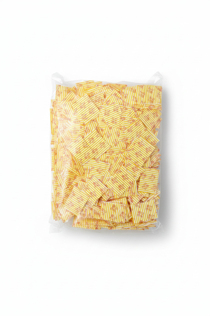 Package of striped wax paper on white background