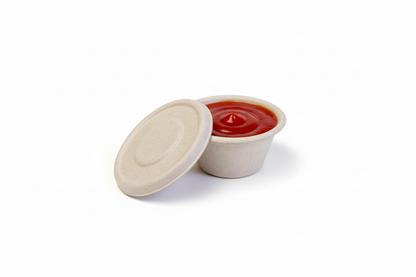 Round container with ketchup and lid